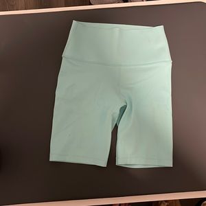 Carbon 38 teal High Rise Biker Short In Diamond Compression